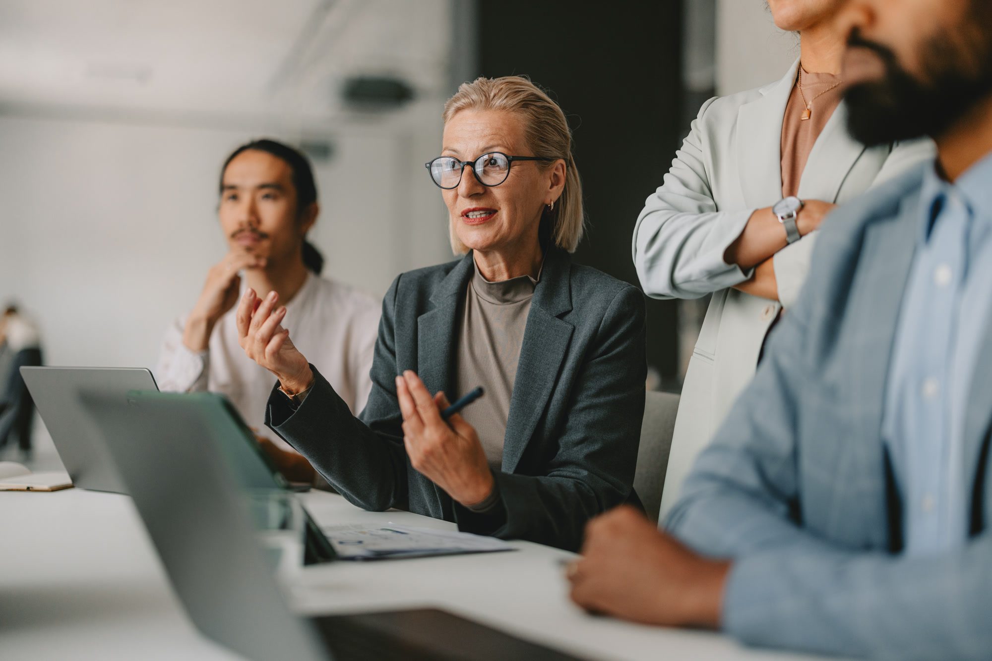 Diverse Group of Professionals in a Business Meeting at Bright Office
